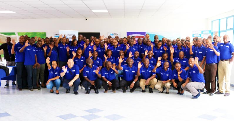 Participants are pictured with Group CEO David Gatende and other executives at the Branch Manager's Conference.