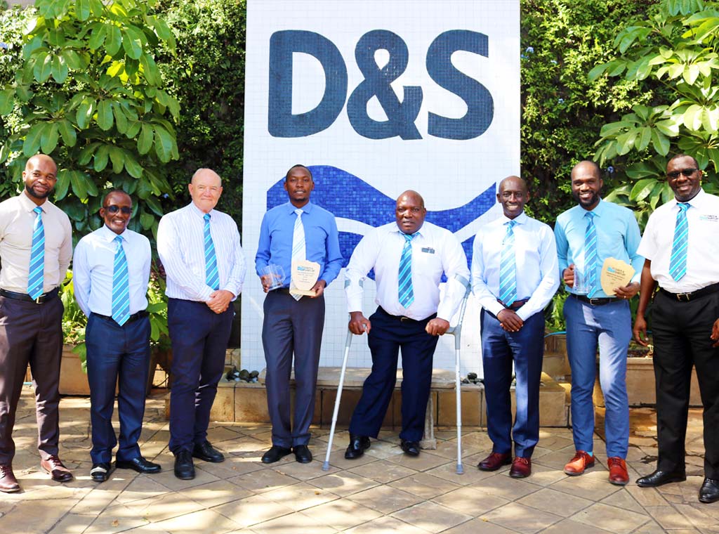 Chairman Alec Davis and Group CEO David Gatende are pictured at D&S Head Office with Business Unit of the Year Award winners from Group ICT and Industrial Area Service